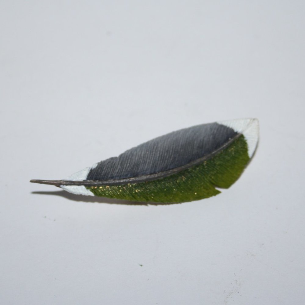 Vintage wooden feather brooch